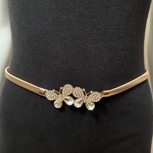 Gold tone metallic butterfly buckle skinny belt